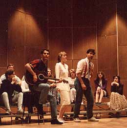 Tony playing guitar at a Pops Concert
