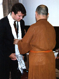 Buddhist Wedding Ceremony: Draping the sash.
